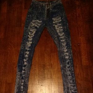 High-waisted ripped jeans